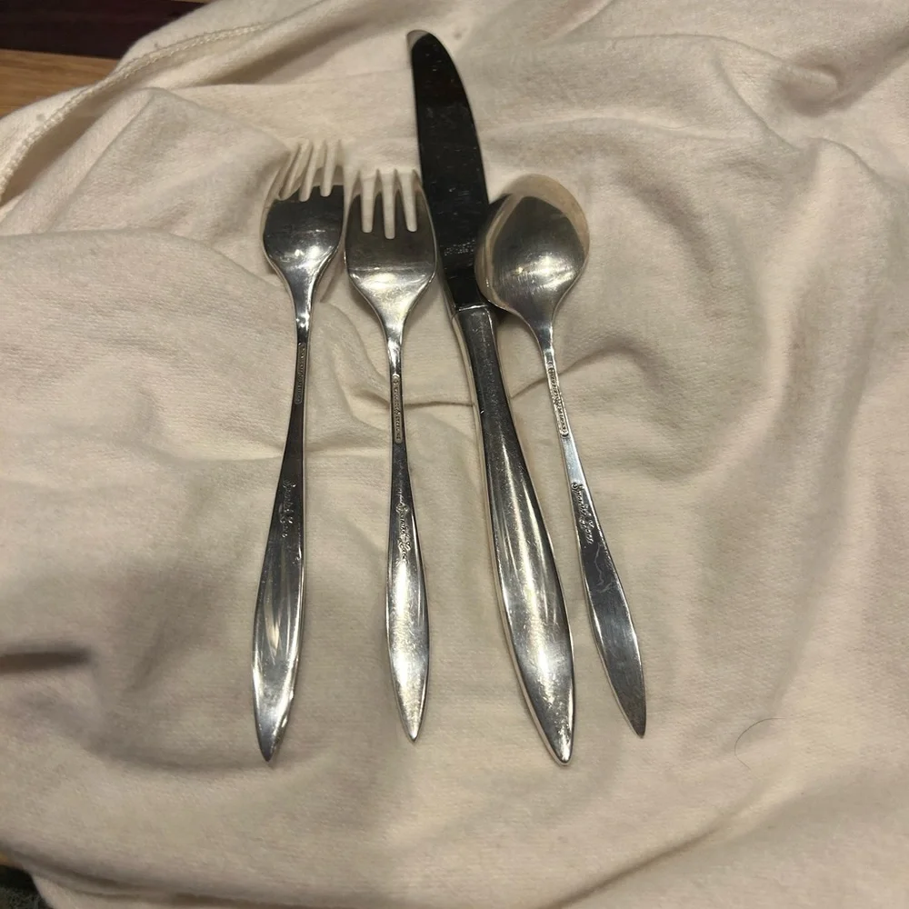 Elegant Spanish Lace Sterling Silverware Set with Intricate Design by Wallace